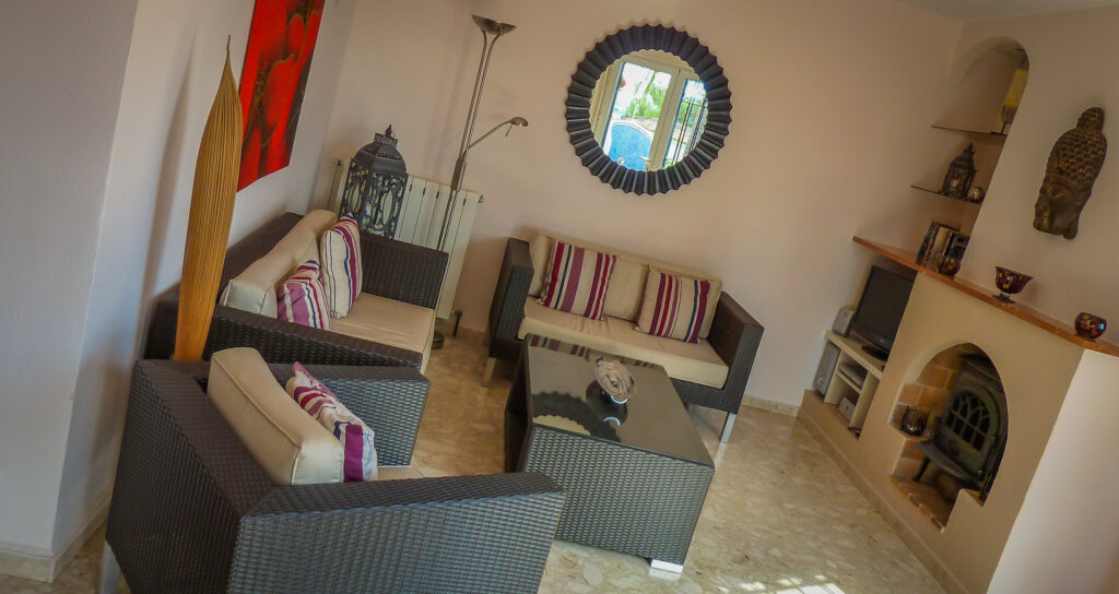 Lounge with sofas and patio doors